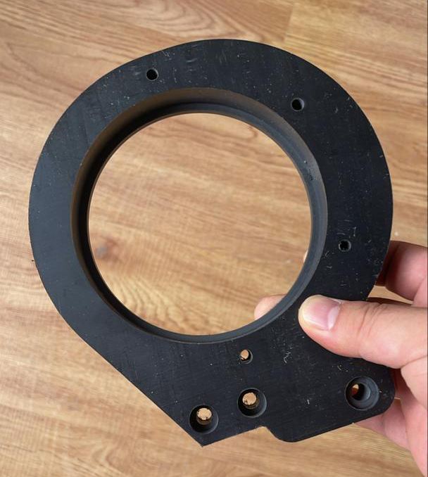 Technical part in 20 mm solid PVC machined on a VERSO CNC machine, with holes and counterbores